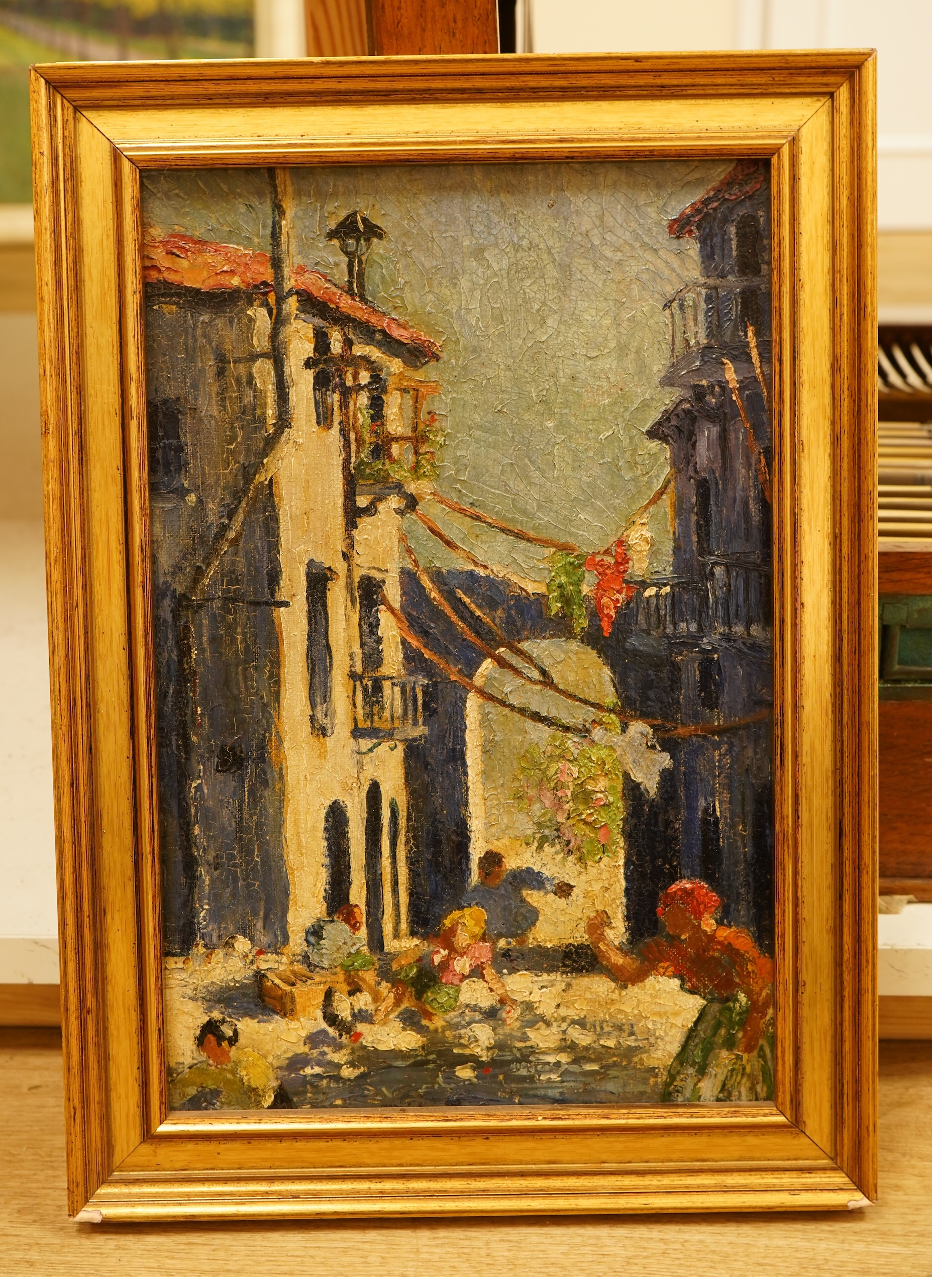 Continental School, Street scene with figures, unsigned, oil on canvas board, 34 x 22cm